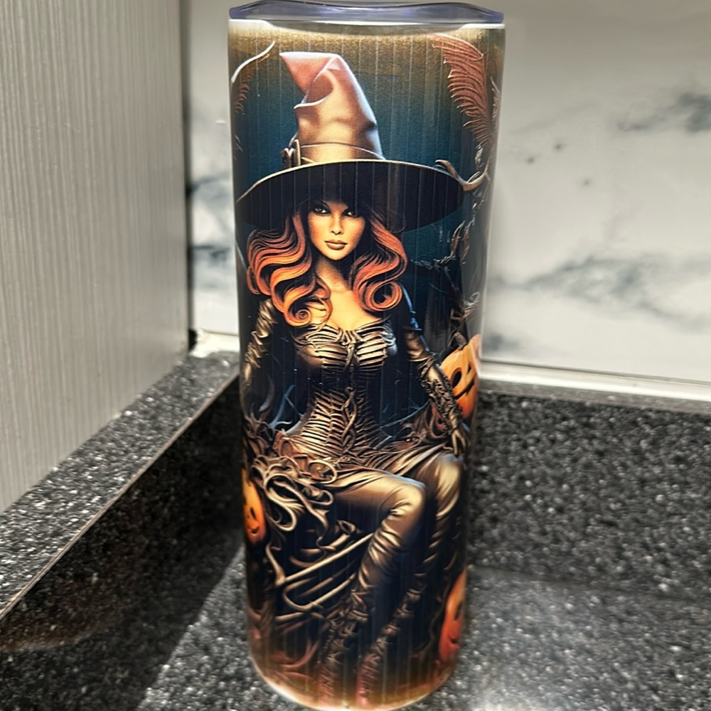 Witch in a tumbler and punkin